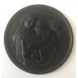 UNUSUAL ROUND BRONZE RELIEF PLAQUE SHOWING RELIGIOUS SCENE