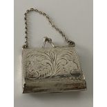 HALLMARKED SILVER MINIATURE TRAVEL PICTURE FRAME IN A SHAPE OF A LADY BAG