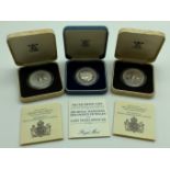 THREE SILVER PROOF COINS