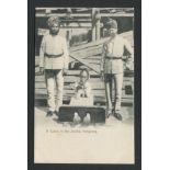 ANTIQUE CHINESE POSTCARD - A COOLIE IN THE STOCKS HONGKONG