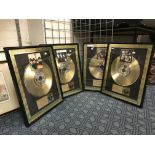 FOUR FRAMED BEATLES DISCS