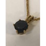 18CT GOLD BLUE SAPPHIRE PENDANT & CHAIN