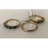 THREE 9CT GOLD DIAMOND RINGS