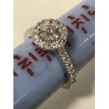 DIAMOND & PLATINUM RING WITH CENTRE STONE OF APPROX 0.70CT F COLOUR US1 WITG GIA REPORT