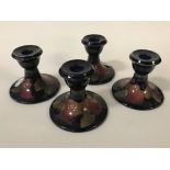 FOUR MOORCROFT CANDLESTICKS