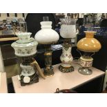 FOUR OIL LAMPS - CONVERTED