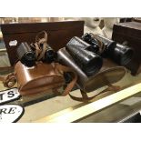 TWO PAIRS OF BINOCULARS