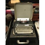 TWO PORTABLE TYPEWRITERS