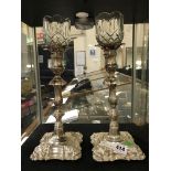 PAIR OF TALL SILVER PLATED CANDLESTICKS