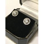 PAIR OF WHITE GOLD DIAMOND HALO EARRINGS 1.30 CARATS TOTAL DIAMOND