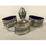 FOUR PIECE HM SILVER & BRISTOL BLUE GLASS LINED SALTS