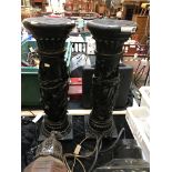 PAIR OF BLACK PAINTED CARVED POT STANDS