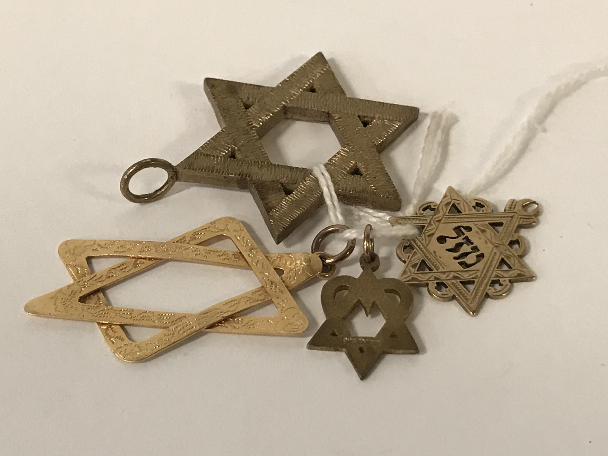 FOUR GOLD STAR OF DAVID PENDANTS