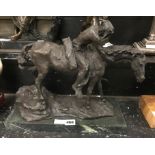 BRONZE MAN ON HORSE