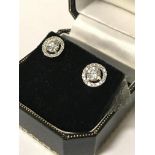 PAIR OF WHITE GOLD DIAMOND HALO EARRINGS 1.30 CARATS TOTAL DIAMOND