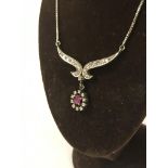 ANTIQUE DIAMOND & RUBY PENDANT ON 14CT GOLD CHAIN