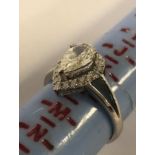 18CT WHITE GOLD PEAR CUT DIAMOND RING WITH DIAMOND SURROUND