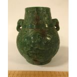 CARVED JADE VASE WITH ELEPHANT HANDLES