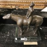 BRONZE MAN ON HORSE