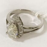 18CT WHITE GOLD PEAR CUT DIAMOND RING WITH DIAMOND SURROUND