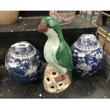 TWO BLUE & WHITE GINGER JARS & A PARROT FIGURE