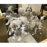 NINE LLADRO DOG FIGURES