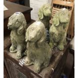 FOUR GARDEN SPANIELS