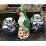 TWO BLUE & WHITE GINGER JARS & A PARROT FIGURE