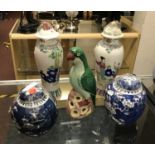 TWO BLUE & WHITE GINGER JARS & A PARROT FIGURE & ANOTHER PAIR OF VASES