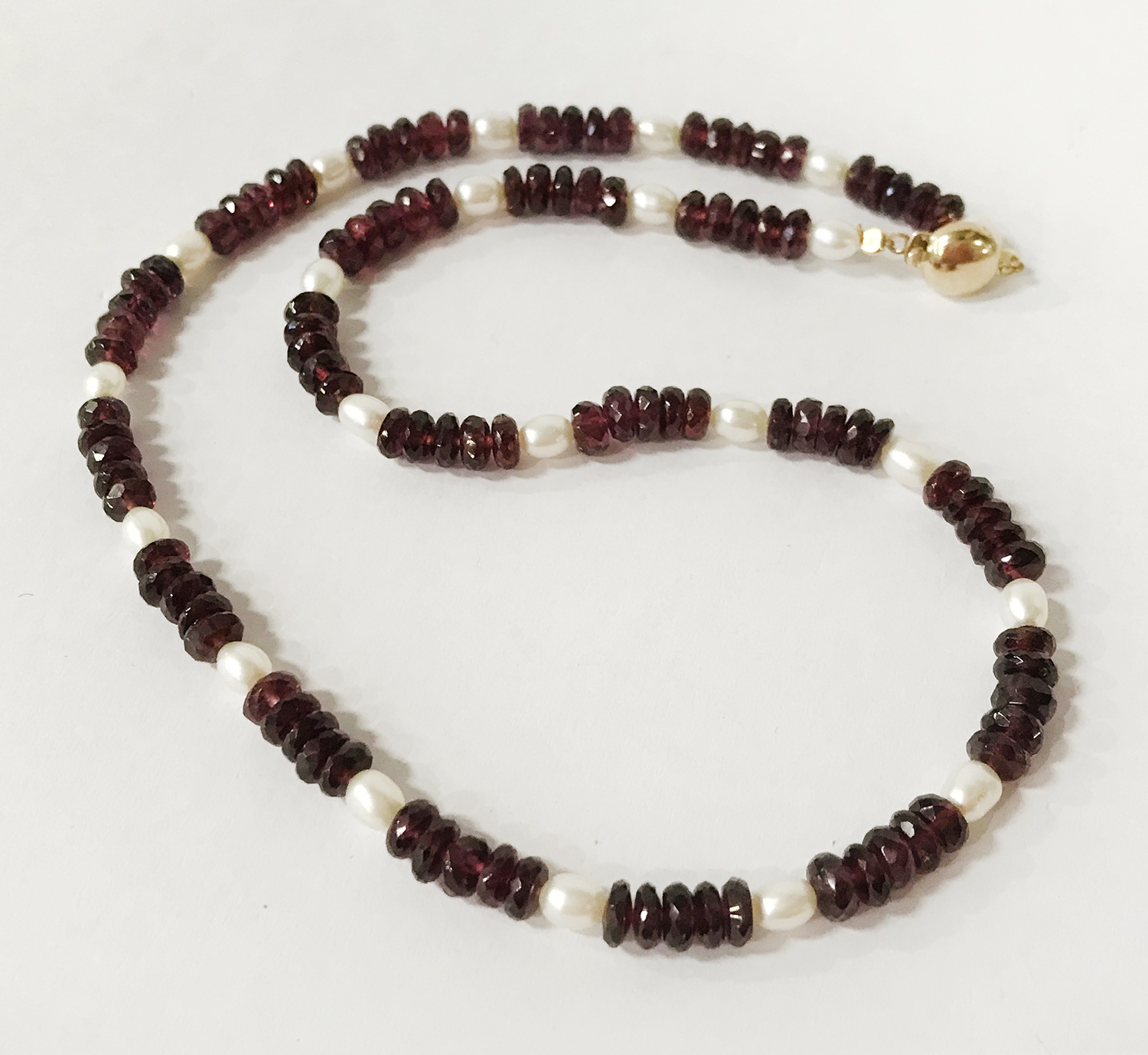 9 CT. GOLD GARNET & AKYO PEARL NECKLACE