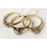 THREE 18CT GOLD SINGLE STONE DIAMOND RINGS