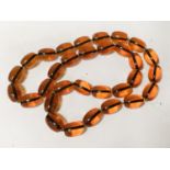 STRING ORANGE BEADS