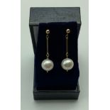 New unworn 9ct gold drop cultured pearl earrings