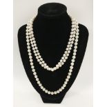 TWO PEARL NECKLACES - 1 9CT CLASP & 1 14CT CLASP