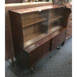 ROSEWOOD GLAZED BOOKCASE ON SIDEBOARD - POSSIBLY BY TREVOR CHIN FOR GORDON RUSSELL - 2 SHELVES