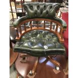 GREEN LEATHER SWIVEL CHAIR