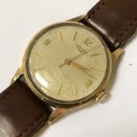 HM 9CT GOLD LONGINES GENTS WRISTWATCH -WORKING, NEEDS A SERVICE