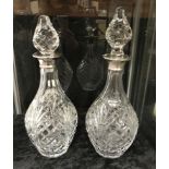 PAIR HM SILVER TOP DECANTERS