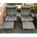 TWO GREY LEATHER SWIVEL CHAIRS & FOOTSTOOLS