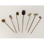 COLLECTION OF GOLD PIN BROOCHES