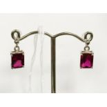 9CT WHITE GOLD RUBY STUD EARRINGS