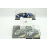 3 Small car Models in display case