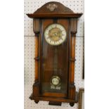 A mahogany cased wall clock