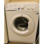 An Indesit innex XWSC61251 automatic washing machine