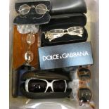 A selection of spectacles including designer sunglasses