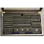 A Danbury Mint 'Collectible Coins of America' set, comprising silver and other coins mounted to