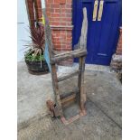 A vintage railway oak and iron sack barrow, marked 'G.L & S'. This was used for display in the