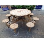 An all rounder eight seater tanalised pine picnic bench, with applied plaques 'For Station Buffet