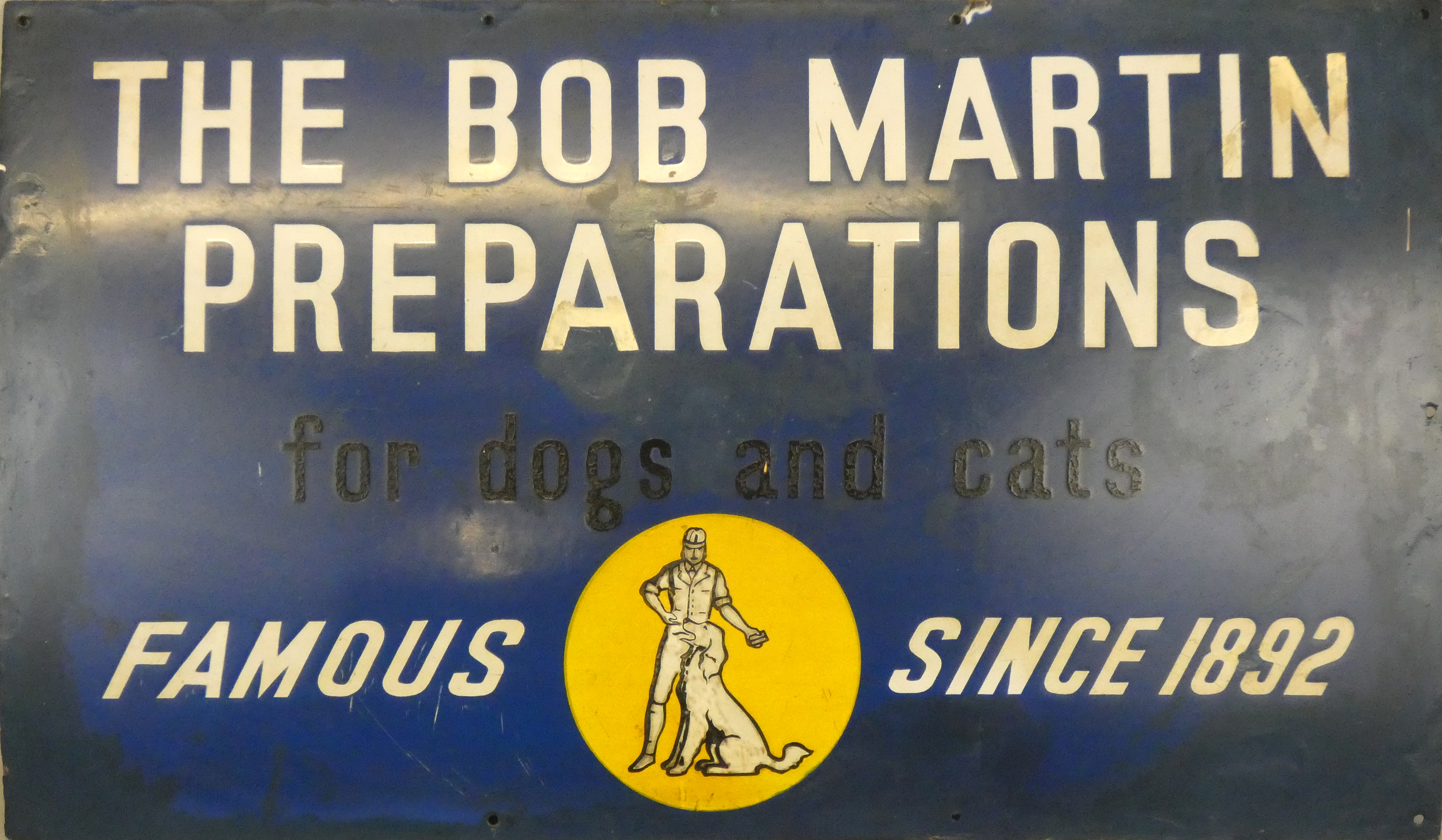 An enamel single sided advertising sign for The Bob Martin Preparation, 51 x 86cm.