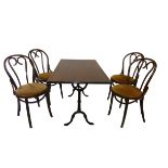 A rectangular wooden topped cast iron table with four Bentwood upholstered chairs, length 120cm,